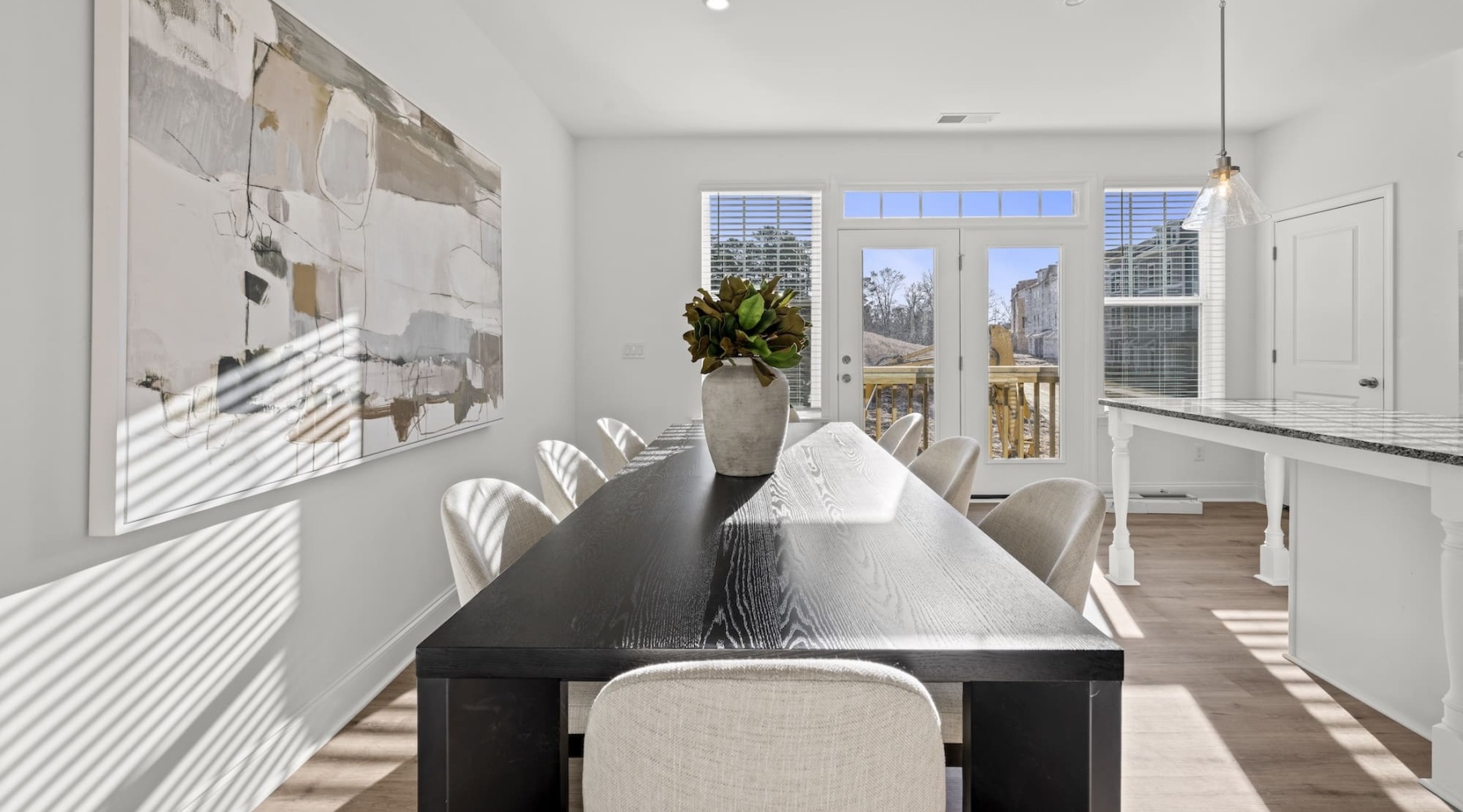 dining area with bright lighting