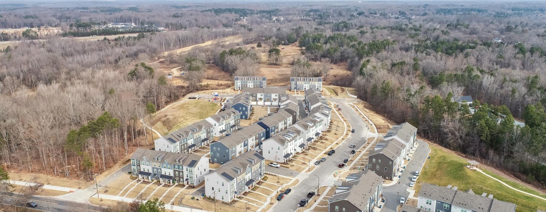 a large area with buildings and trees