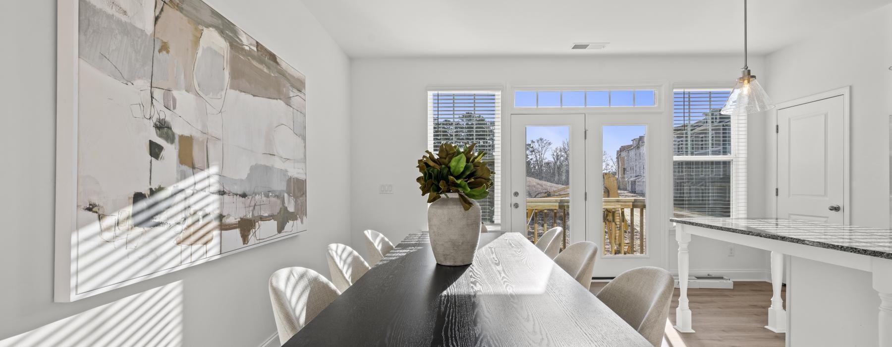 a dining room with a large table