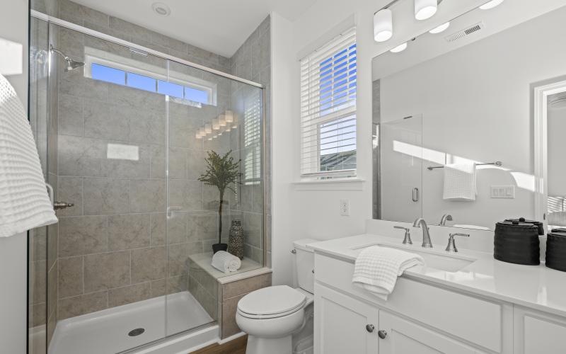 a bathroom with a glass shower